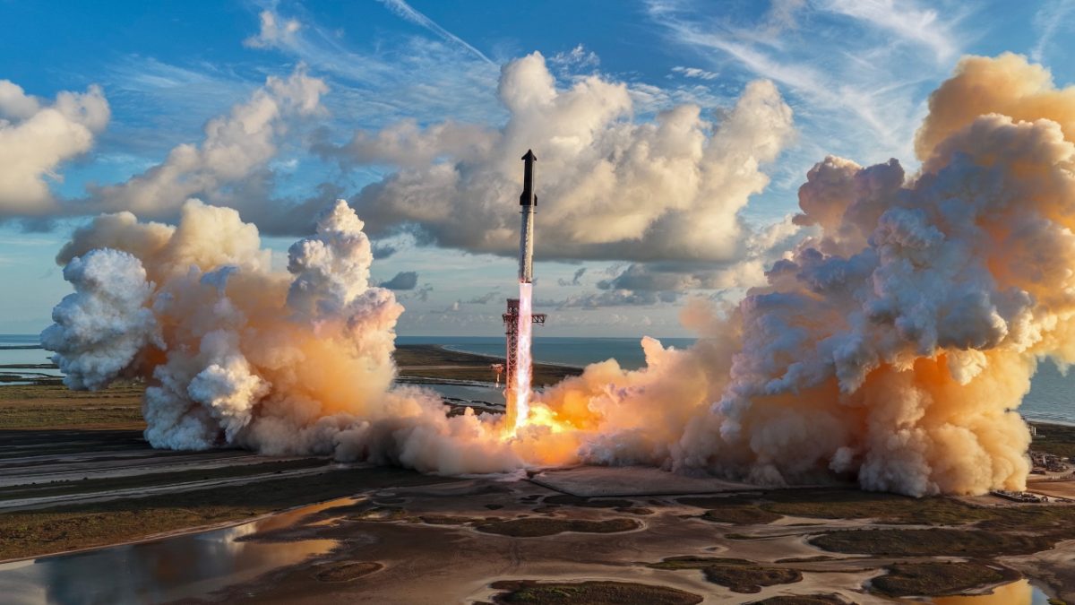 A SpaceX Starship rocket lifting off from the launch tower in a cloud of exhaust.